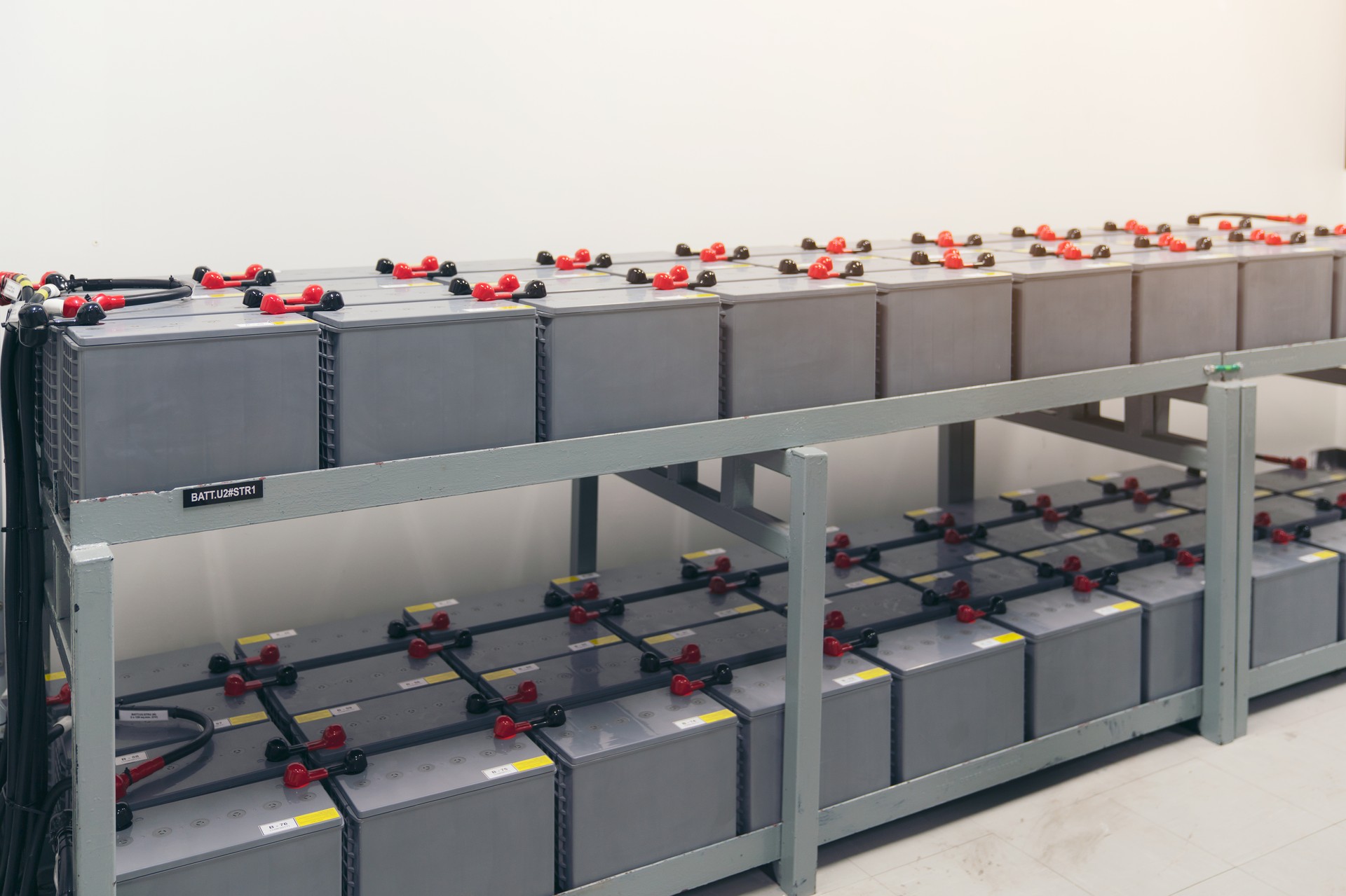 Battery pack in battery room in power plant for supply electricity in plant during shutdown phase, Rows of batteries in industrial backup power system.